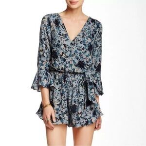 FREE PEOPLE Romper ALL THE RIGHT RUFFLES BLUE Floral Size Small Boho Festival